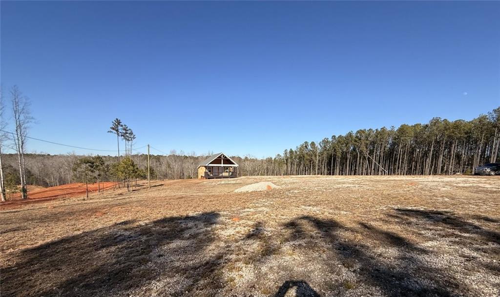 3445 Silas Mercer Road Northeast Crawfordville, GA 30631 - Photo 1 of 12 a view of beach and ocean