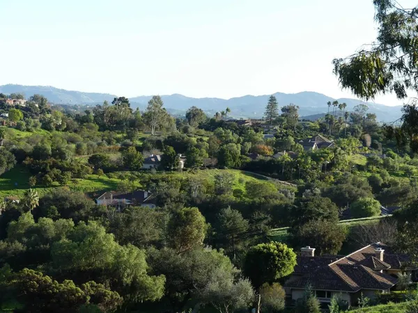 an aerial view of residential house and outdoor space
