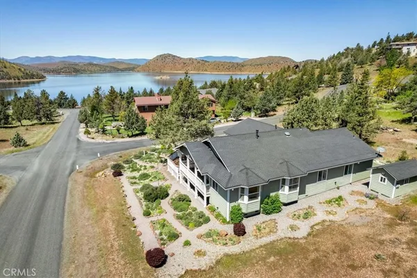 a view of a terrace with a garden and mountain view