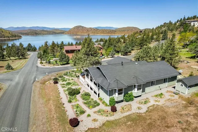 a view of a terrace with a garden and mountain view