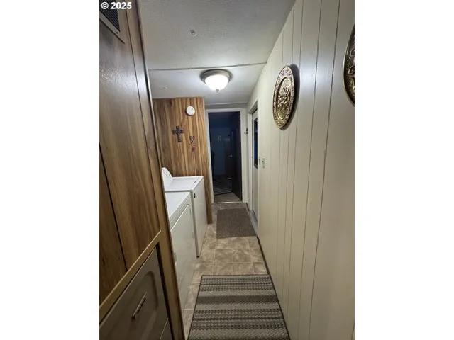 a view of a hallway with entryway