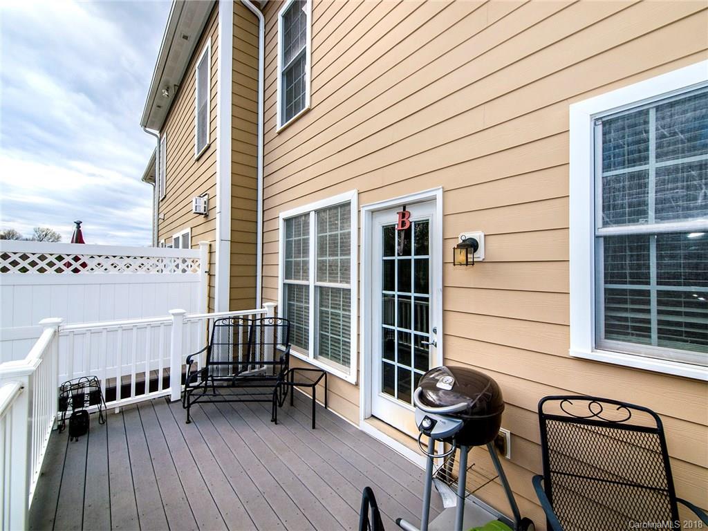 566 6th Baxter Crossing Fort Mill, SC 29708 - Photo 13 of 25 a view of a balcony with chairs and a table