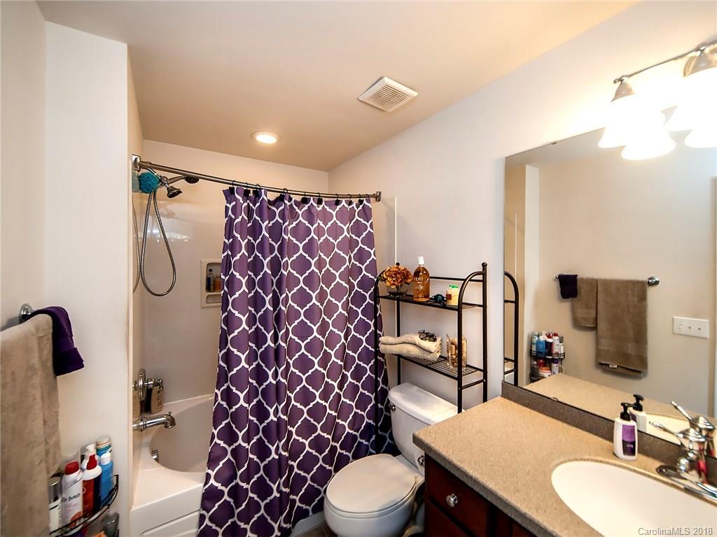 566 6th Baxter Crossing Fort Mill, SC 29708 - Photo 16 of 25 a bathroom with a sink toilet and shower