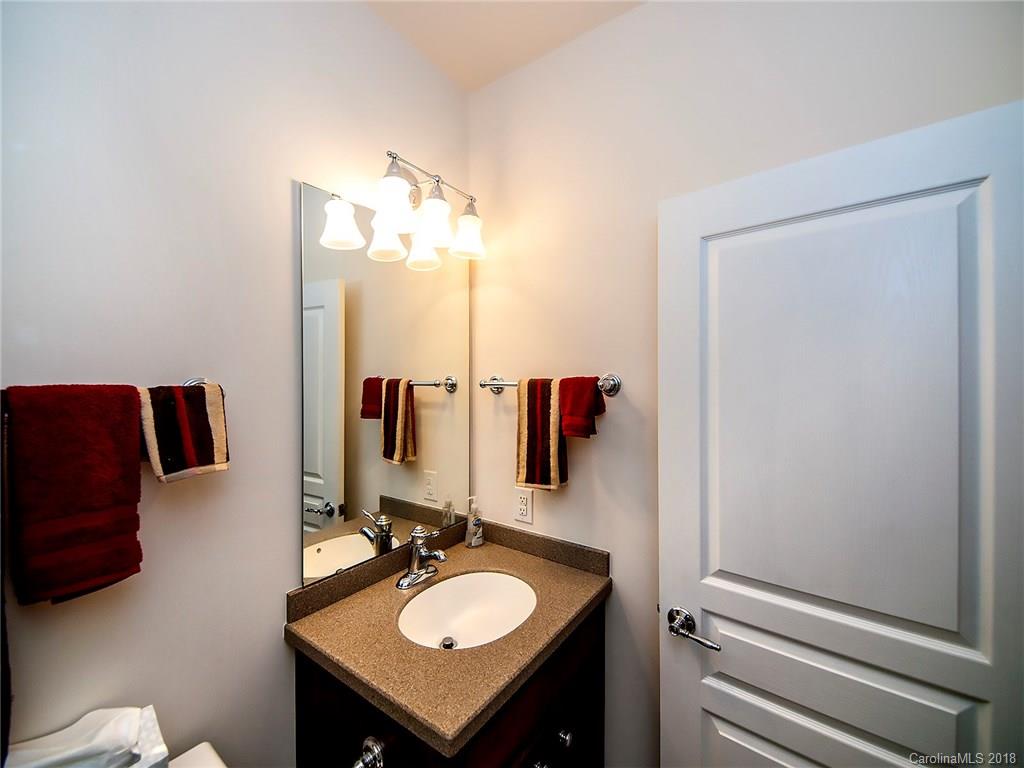 566 6th Baxter Crossing Fort Mill, SC 29708 - Photo 24 of 25 a bathroom with a sink vanity and a mirror