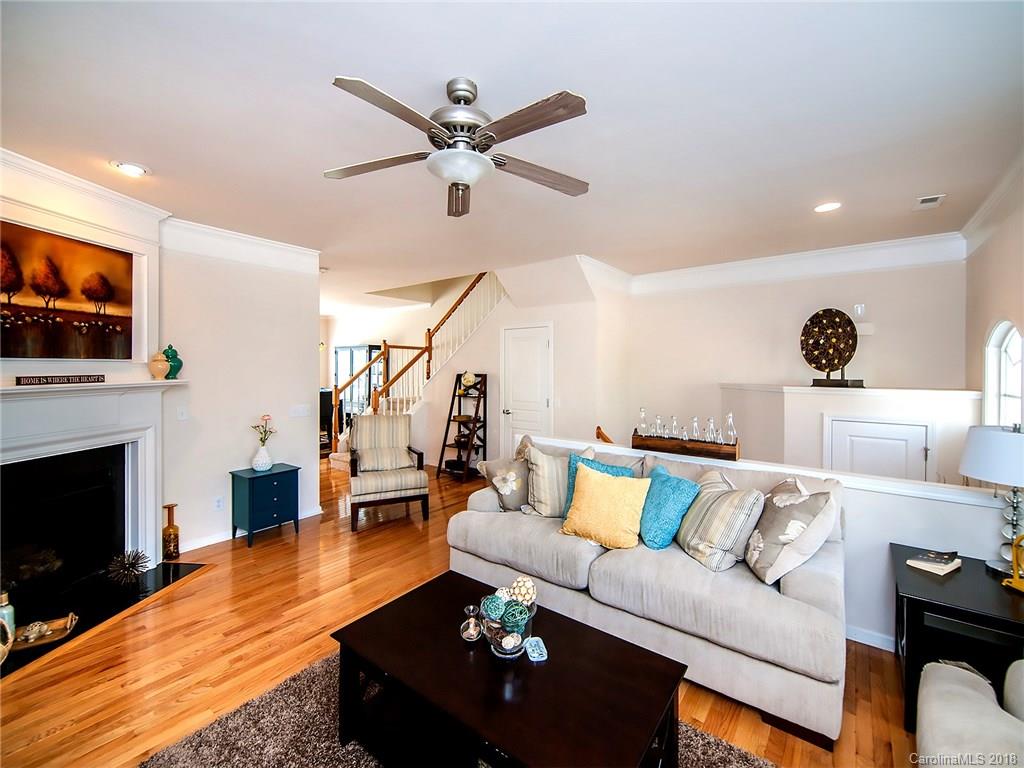 566 6th Baxter Crossing Fort Mill, SC 29708 - Photo 4 of 25 a living room with furniture and a fireplace