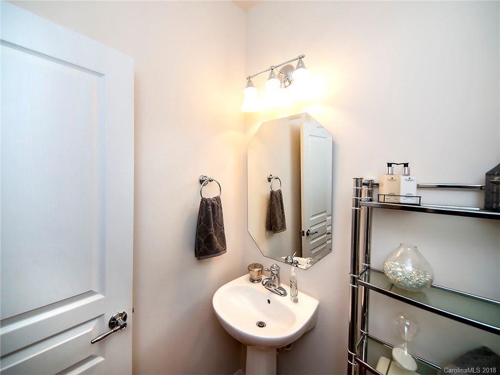 566 6th Baxter Crossing Fort Mill, SC 29708 - Photo 5 of 25 a bathroom with a sink and mirror