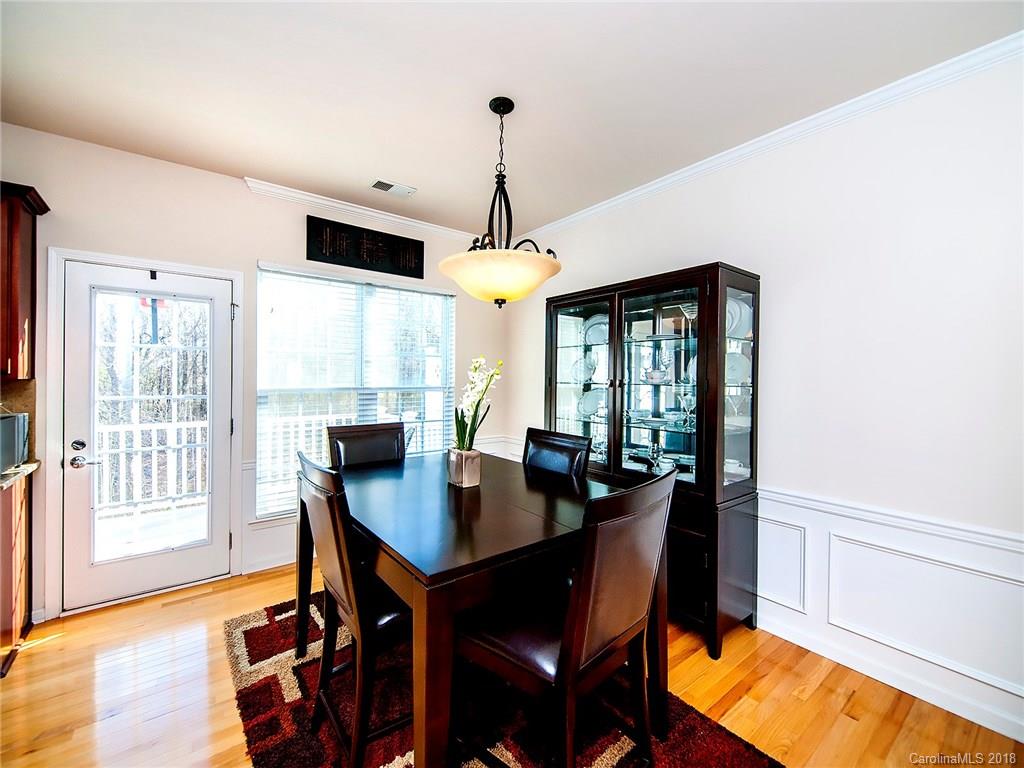 566 6th Baxter Crossing Fort Mill, SC 29708 - Photo 7 of 25 a dining room with furniture window wooden floor