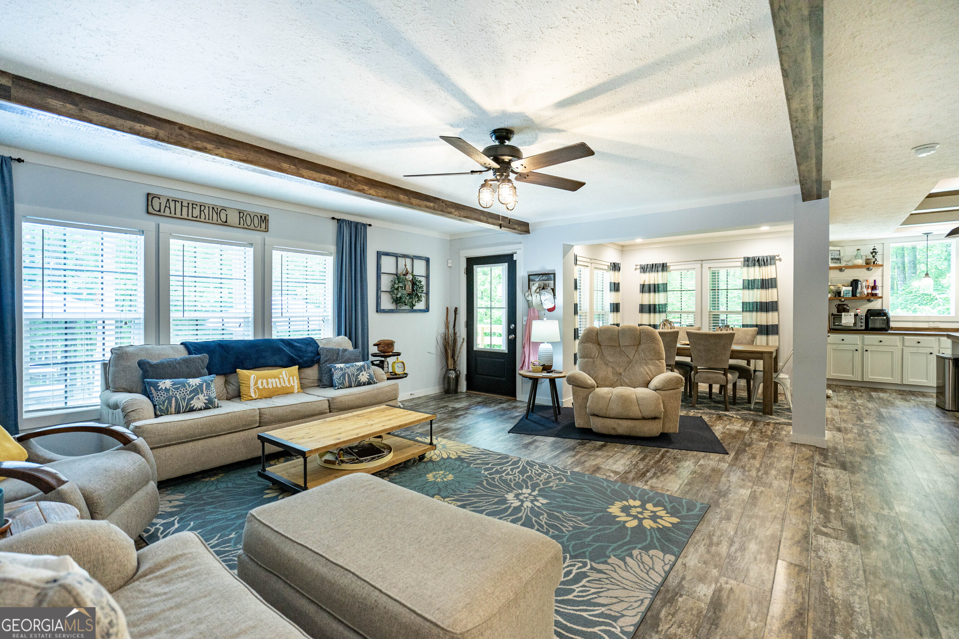 1249 County Road 446 Five Points, AL 36855 - Photo 13 of 41 a living room with furniture and a large window