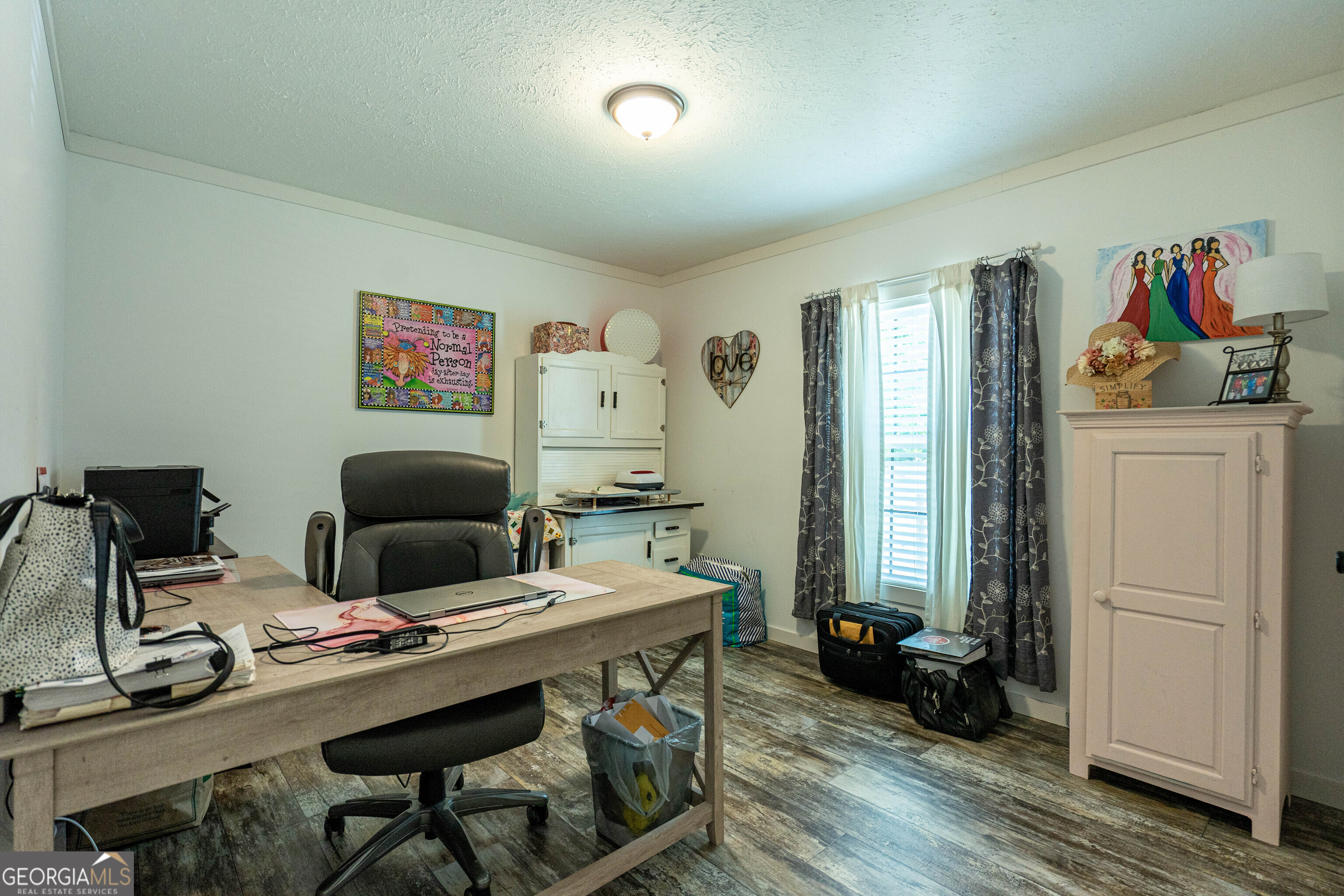 1249 County Road 446 Five Points, AL 36855 - Photo 16 of 41 a living room with furniture and wooden floor