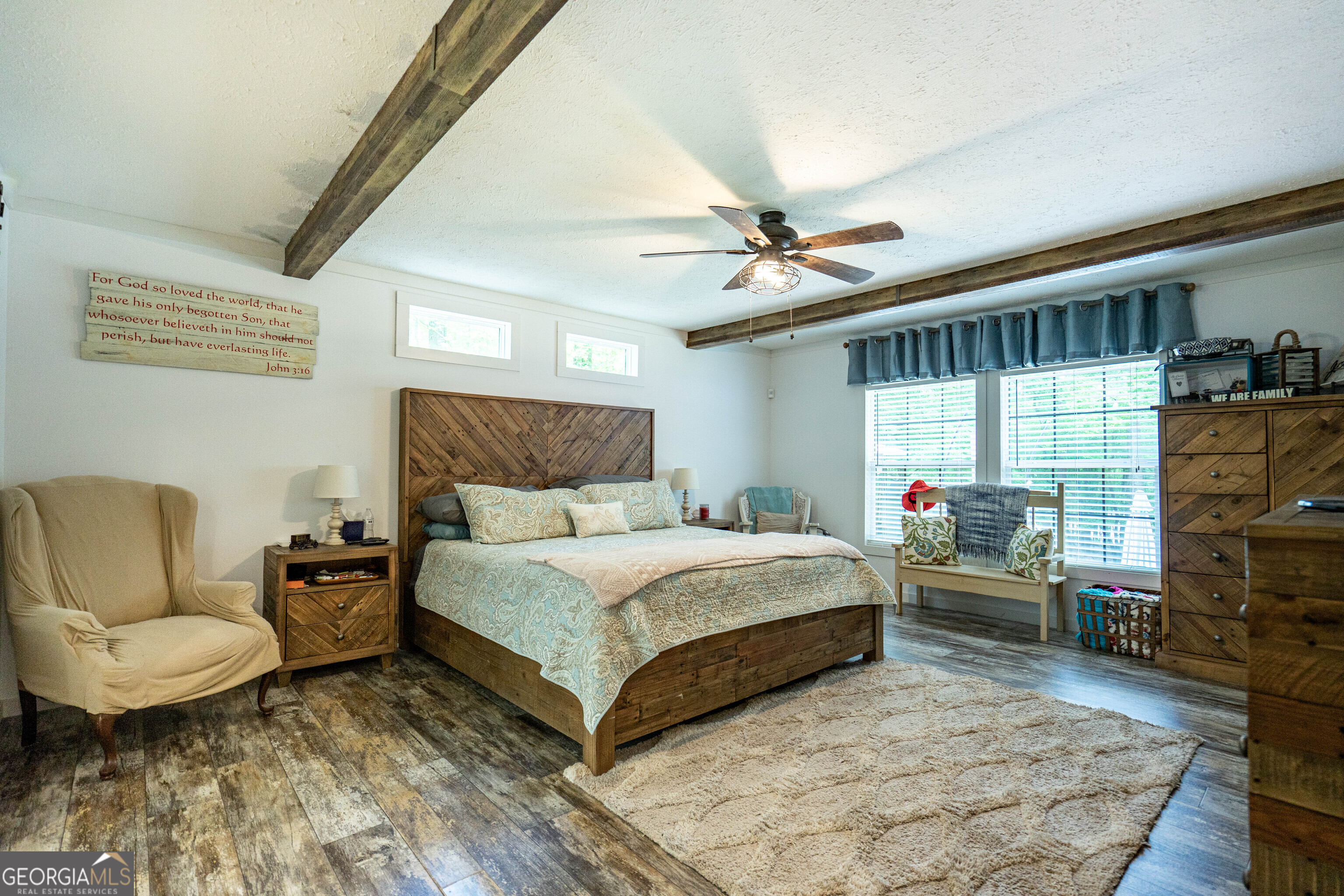 1249 County Road 446 Five Points, AL 36855 - Photo 19 of 41 a bedroom with a bed a couch and dresser