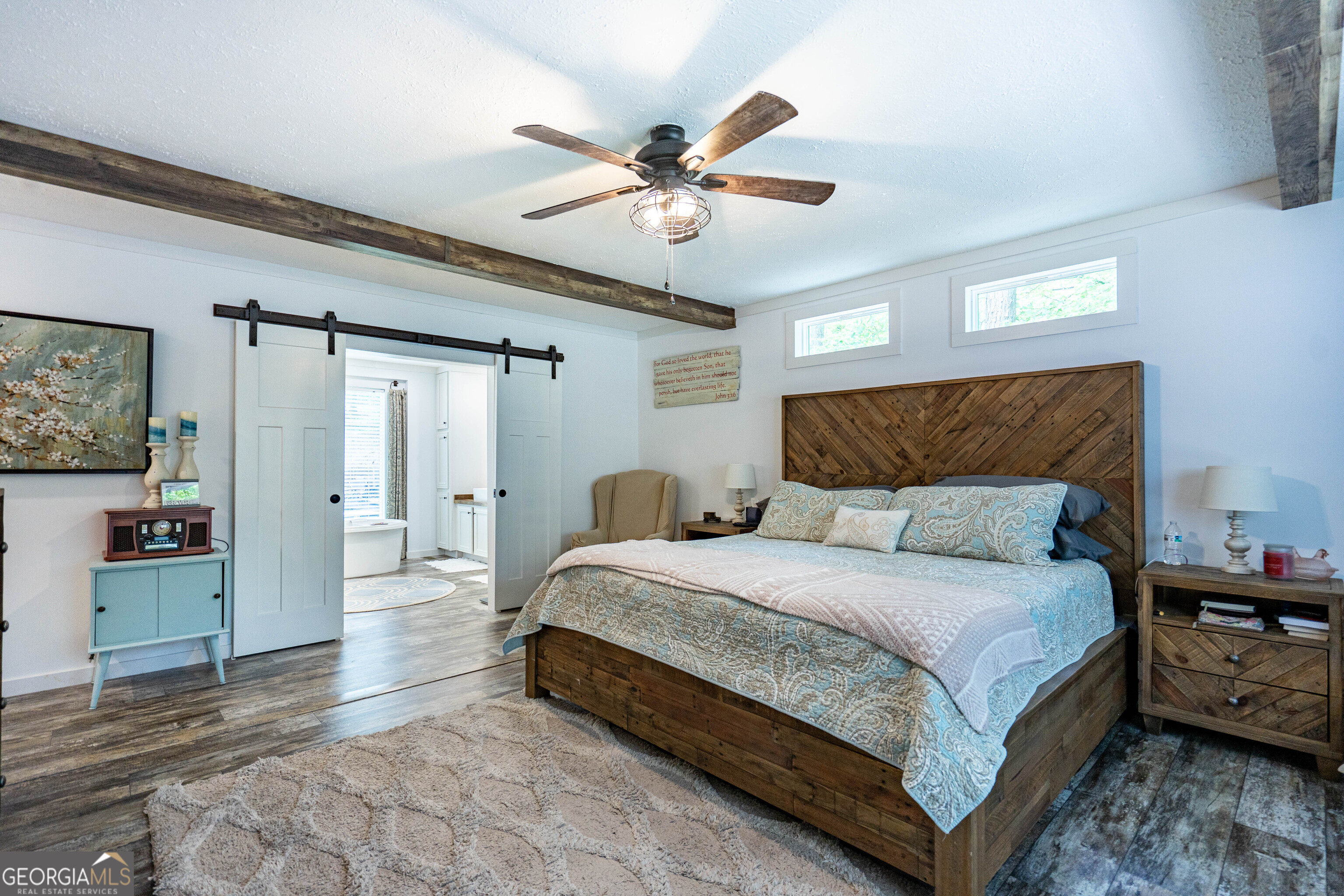 1249 County Road 446 Five Points, AL 36855 - Photo 20 of 41 a bedroom with a bed and ceiling fan