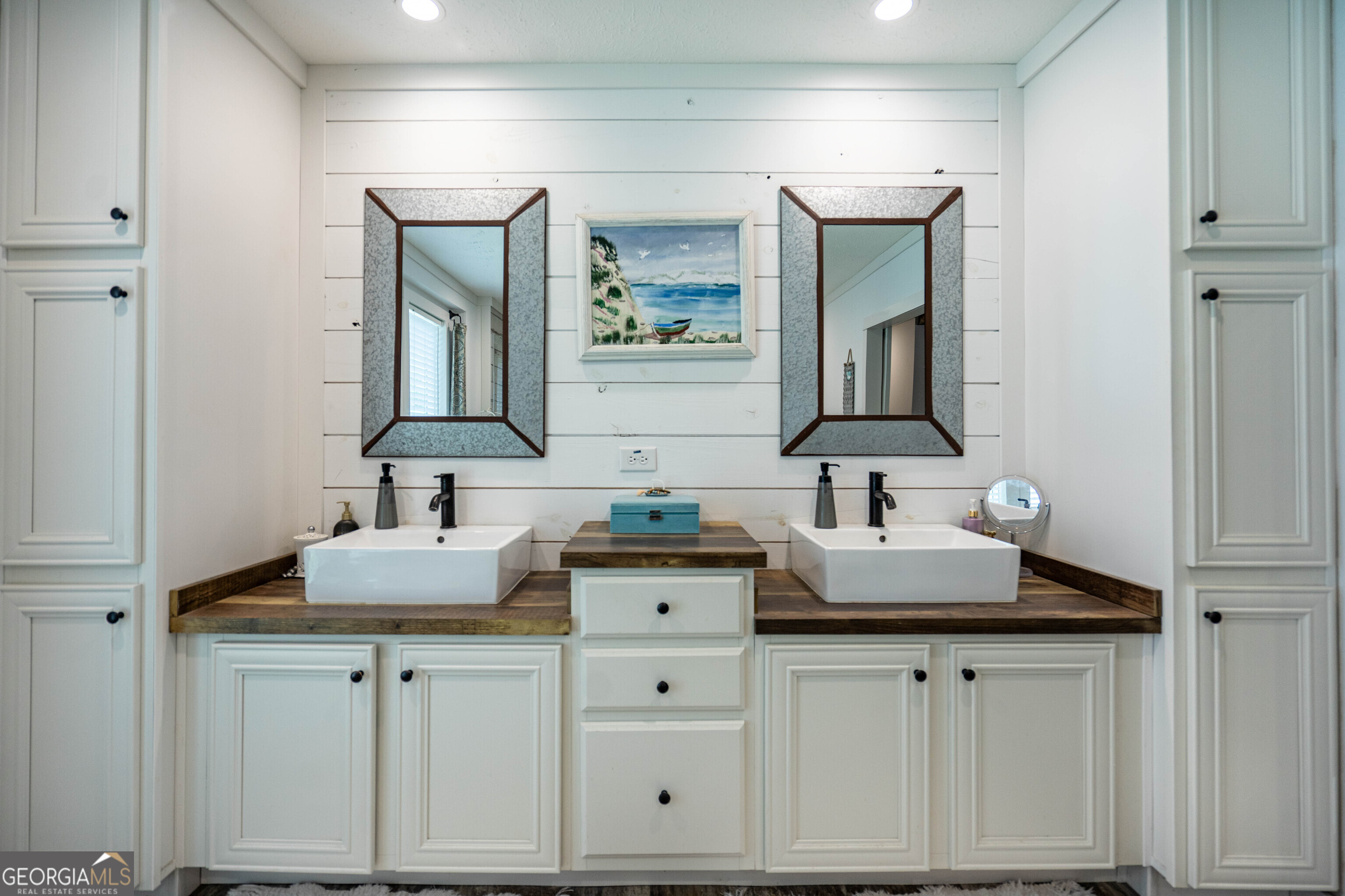 1249 County Road 446 Five Points, AL 36855 - Photo 21 of 41 a bathroom with double vanity sink and a mirror