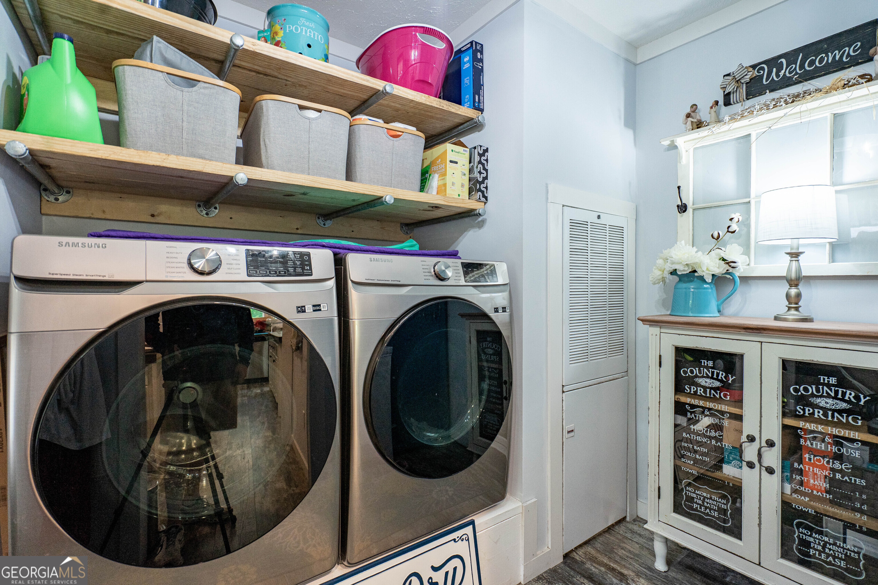 1249 County Road 446 Five Points, AL 36855 - Photo 5 of 41 a view of washer and dryer in a kitchen