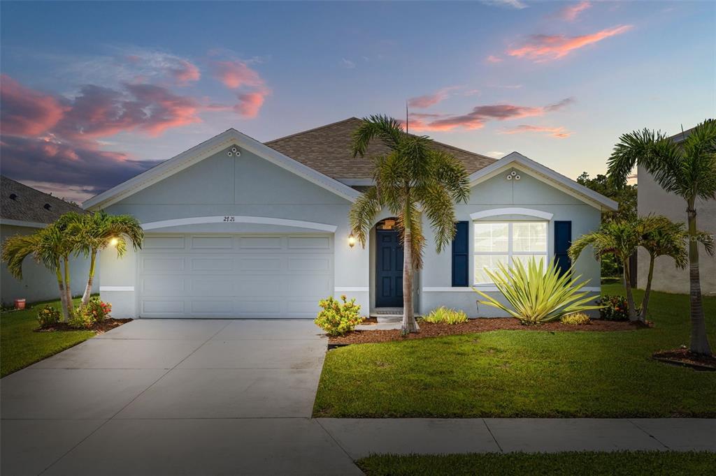 a view of a yard in front of a house