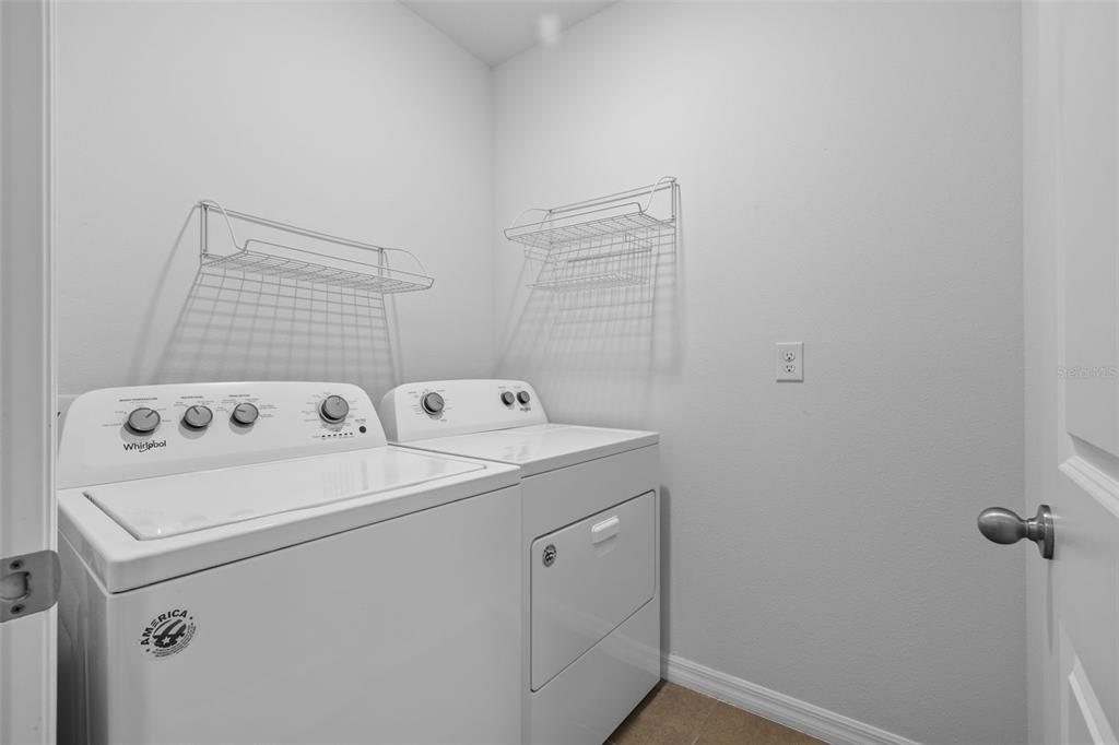 2721 Greenleaf Terrace Parrish, FL 34219 - Photo 18 of 65 a utility room with dryer and washer