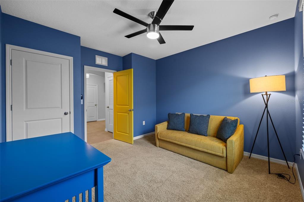 2721 Greenleaf Terrace Parrish, FL 34219 - Photo 20 of 65 a living room with furniture and a flat screen tv