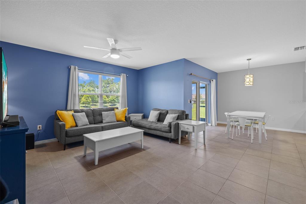 2721 Greenleaf Terrace Parrish, FL 34219 - Photo 30 of 65 a living room with furniture and a window