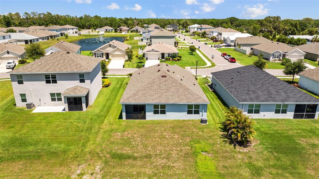 2721 Greenleaf Terrace Parrish, FL 34219 - Photo 52 of 65 a aerial view of a house with a swimming pool