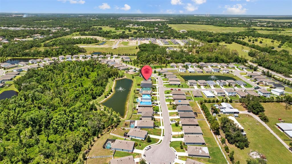 2721 Greenleaf Terrace Parrish, FL 34219 - Photo 58 of 65 an aerial view of residential houses with outdoor space