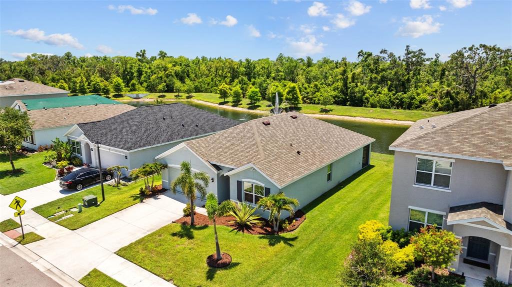 2721 Greenleaf Terrace Parrish, FL 34219 - Photo 60 of 65 a aerial view of a house with swimming pool and big yard