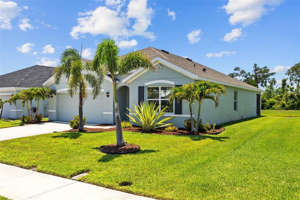 2721 Greenleaf Terrace Parrish, FL 34219 - Photo 8 of 65 a view of a house with a yard