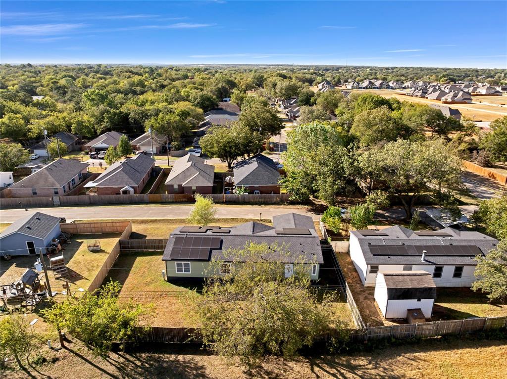 312 6th Street Joshua, TX 76058 - Photo 29 of 33 an aerial view of residential houses with outdoor space