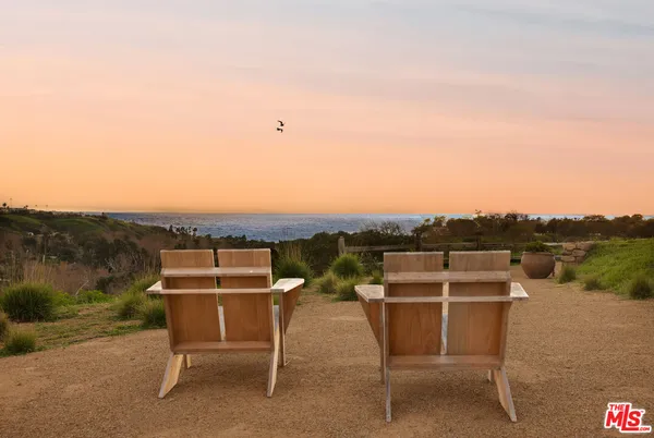 a view of a terrace with sitting area