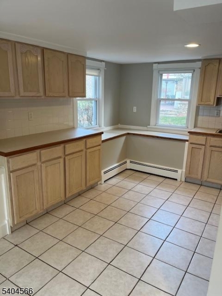 96 Ridgedale Avenue Madison, NJ 07940 - Photo 3 of 11 a kitchen with a sink and cabinets