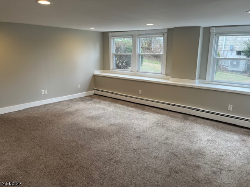 96 Ridgedale Avenue Madison, NJ 07940 - Photo 4 of 11 a view of an empty room with a window