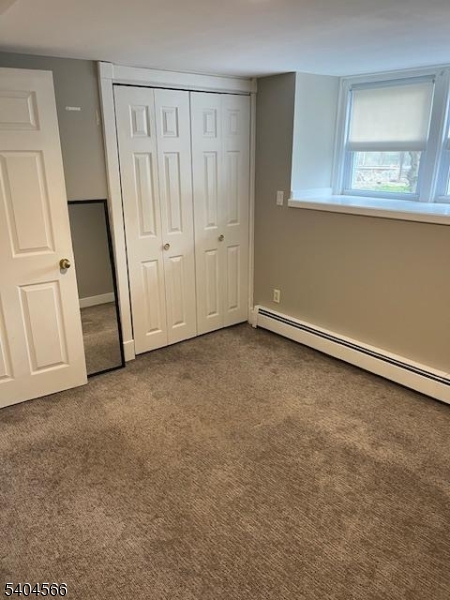 96 Ridgedale Avenue Madison, NJ 07940 - Photo 7 of 11 an empty room with windows
