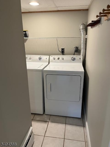 96 Ridgedale Avenue Madison, NJ 07940 - Photo 9 of 11 a utility room with dryer and washer