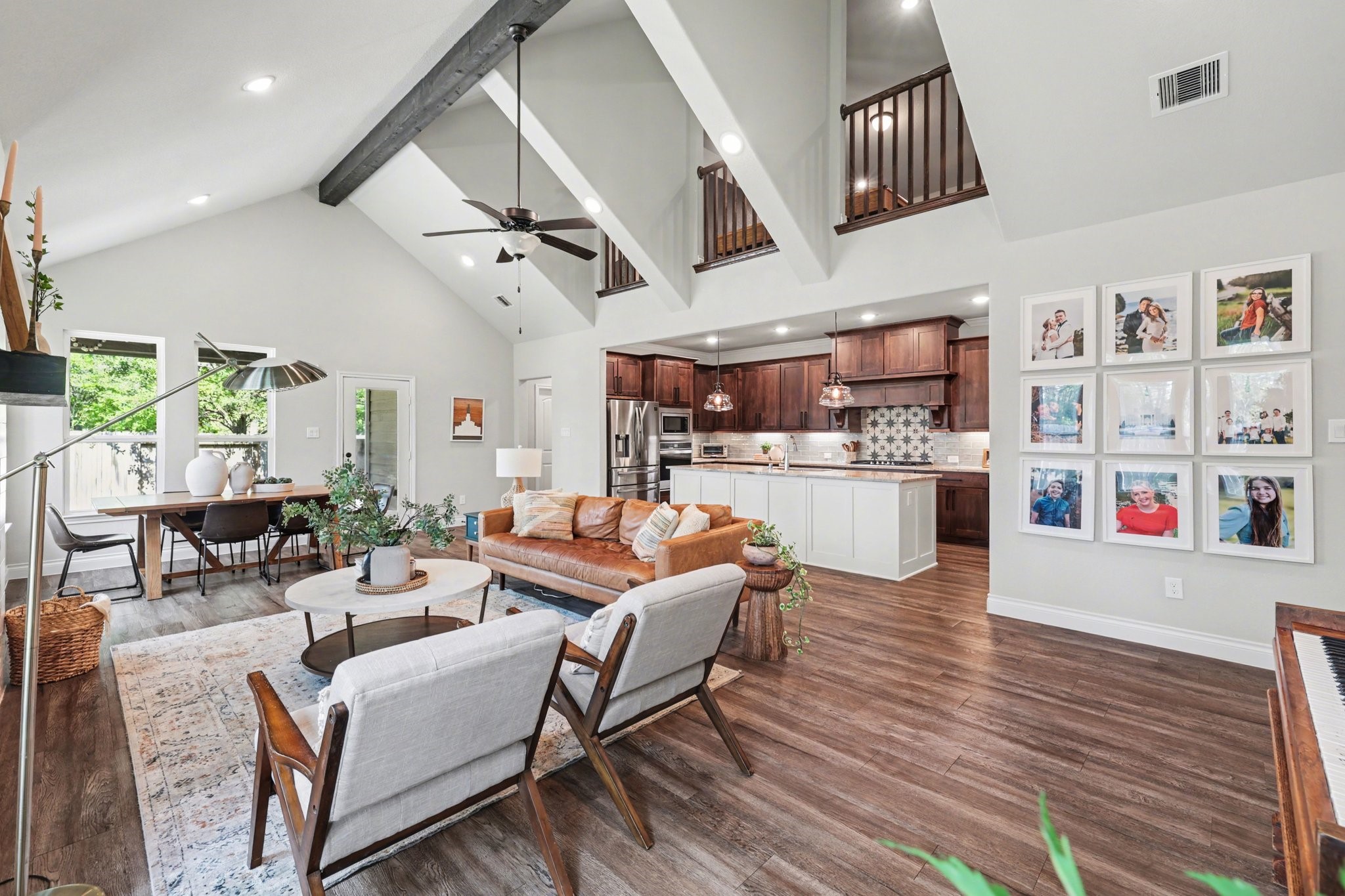 21006 Brave Legion Way Tomball, TX 77375 - Photo 11 of 29 a living room with fireplace furniture and a wooden floor