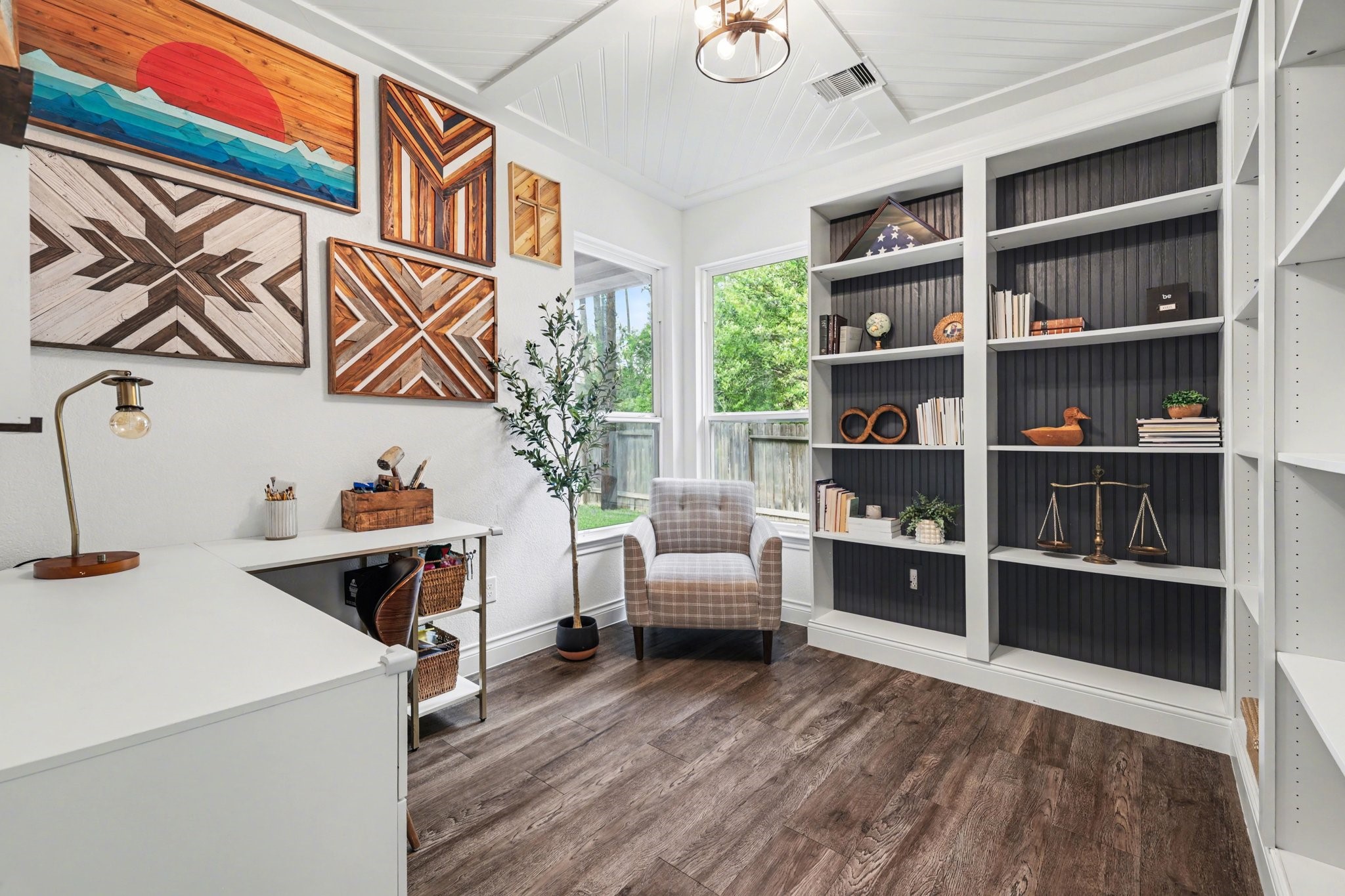 21006 Brave Legion Way Tomball, TX 77375 - Photo 17 of 29 a living room with furniture and a book shelf