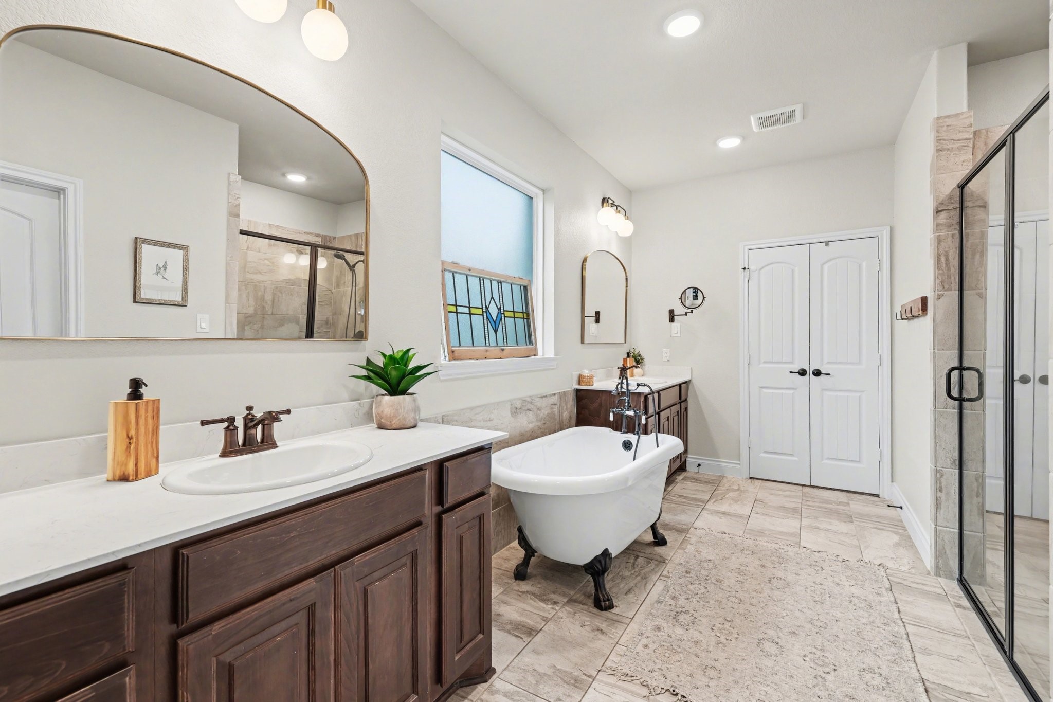 21006 Brave Legion Way Tomball, TX 77375 - Photo 19 of 29 a spacious bathroom with a sink toilet and shower