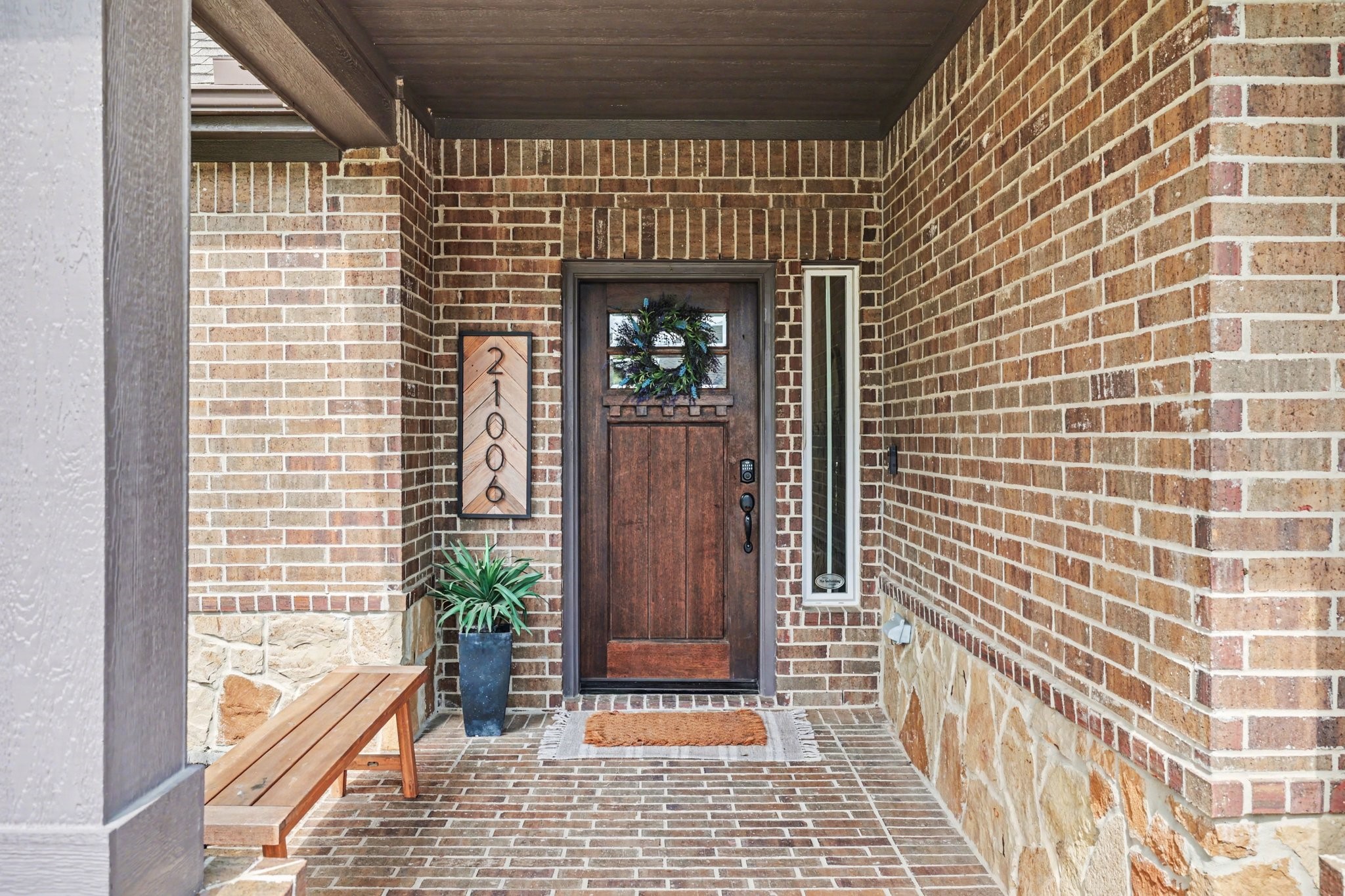 21006 Brave Legion Way Tomball, TX 77375 - Photo 4 of 29 a view of a balcony with a potted plant