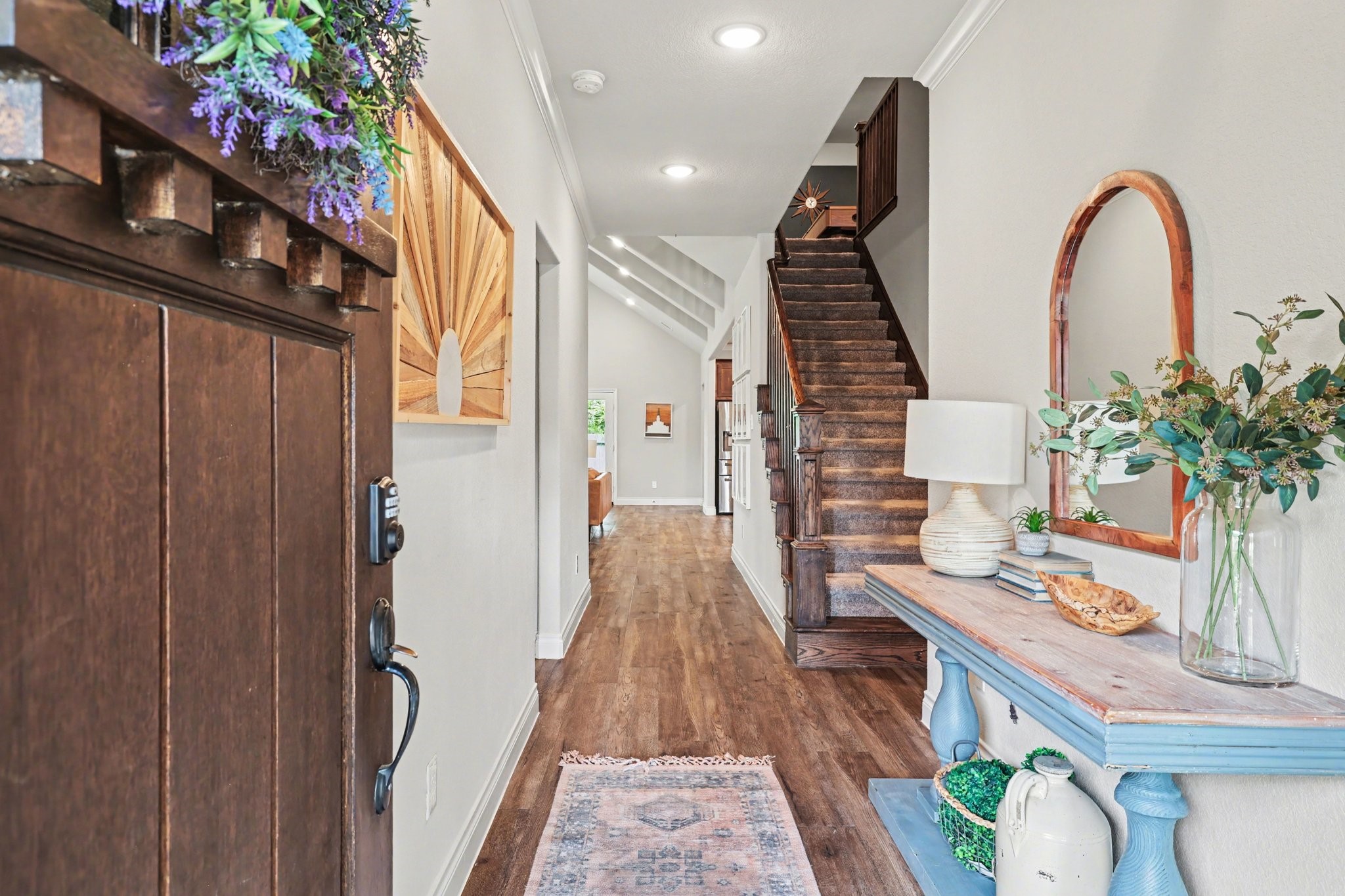 21006 Brave Legion Way Tomball, TX 77375 - Photo 5 of 29 a view of living room filled with furniture and wooden floor