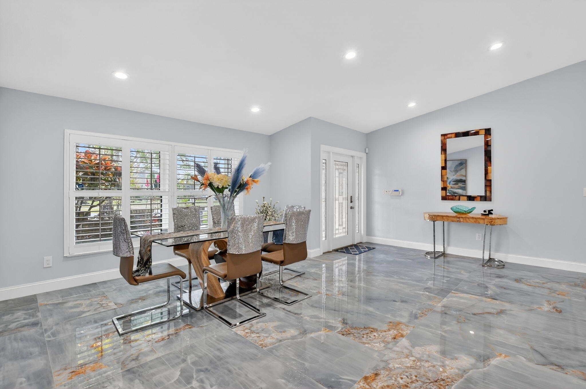 10294 Crosswind Road Boca Raton, FL 33498 - Photo 12 of 71 a living room with furniture and large windows