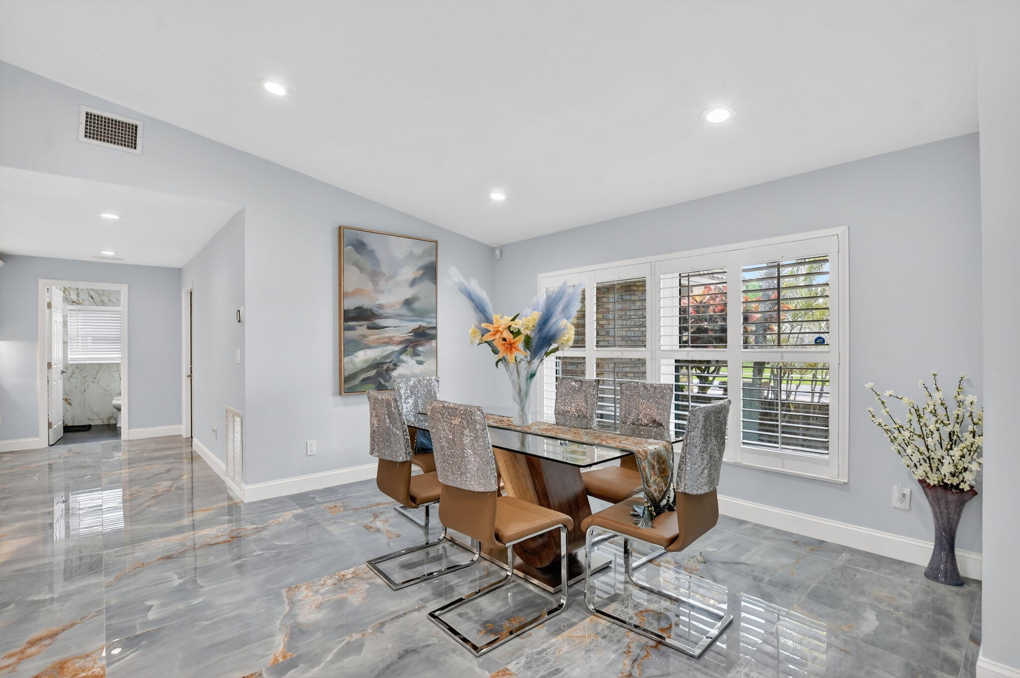 10294 Crosswind Road Boca Raton, FL 33498 - Photo 13 of 71 a view of a livingroom with furniture and a potted plant
