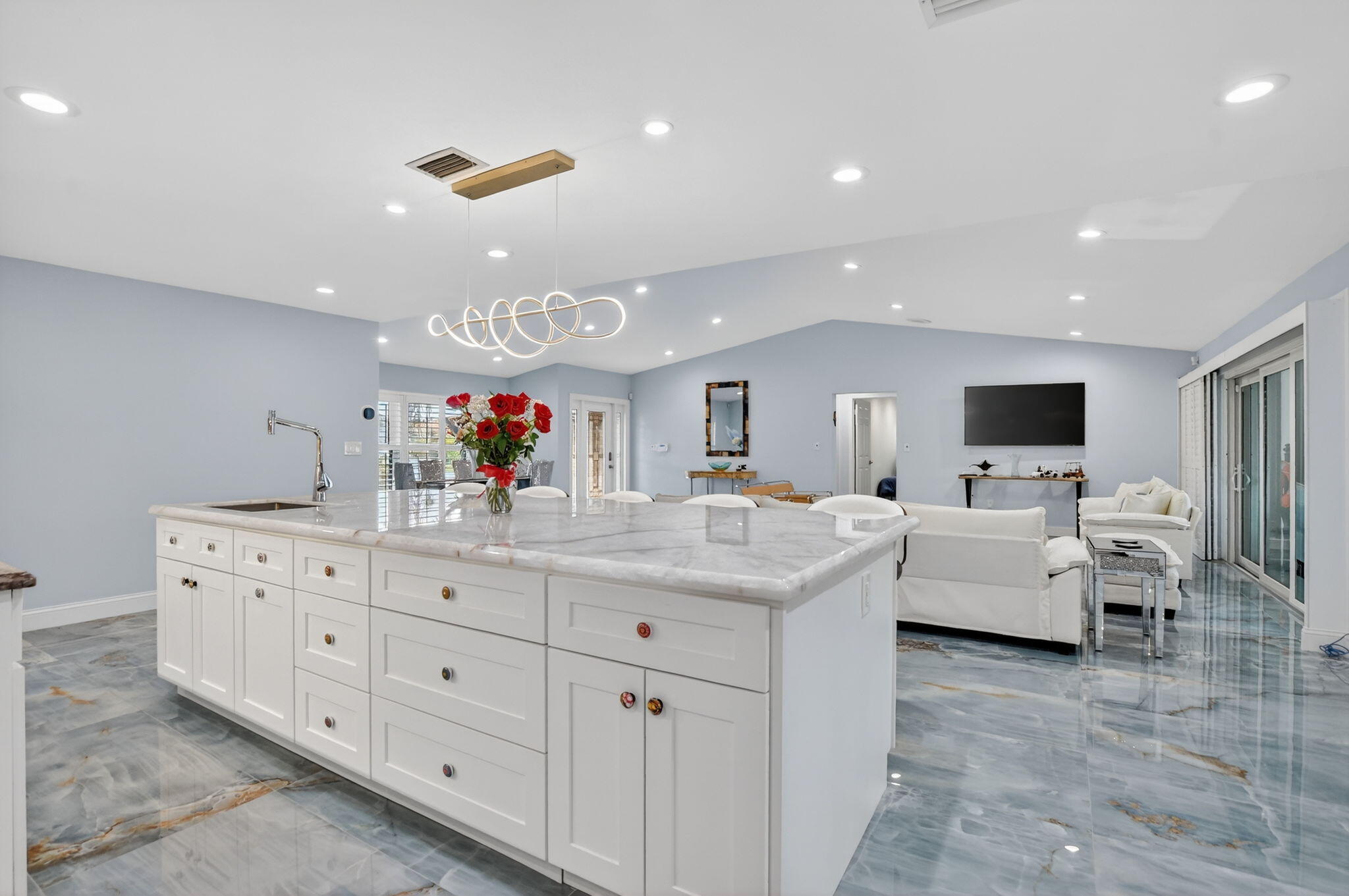 10294 Crosswind Road Boca Raton, FL 33498 - Photo 19 of 71 a living room with furniture and a flat screen tv