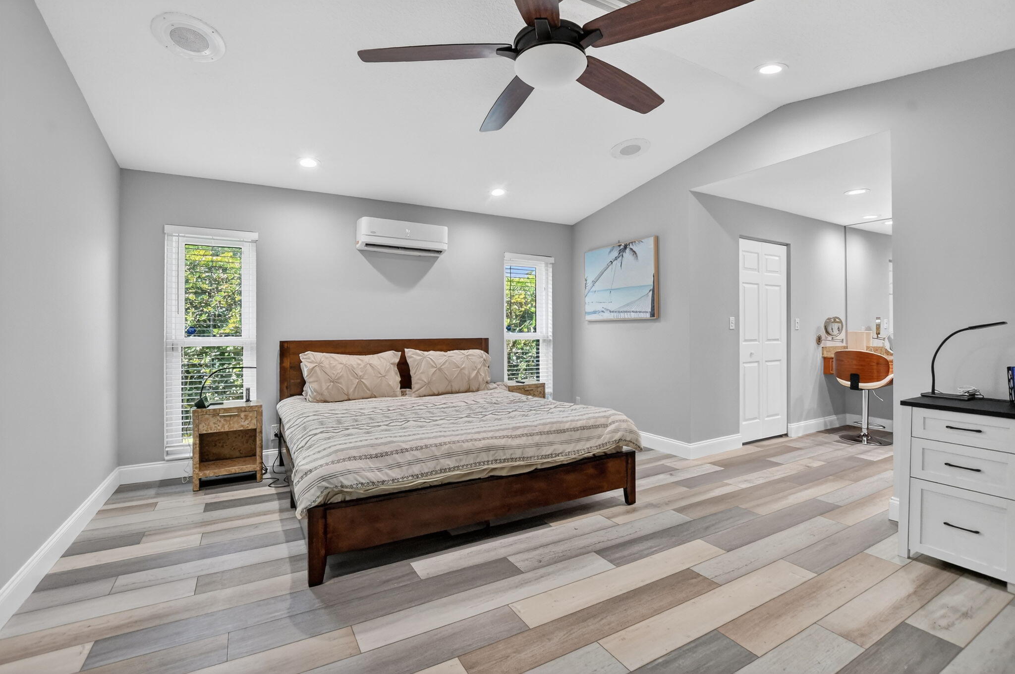 10294 Crosswind Road Boca Raton, FL 33498 - Photo 25 of 71 a spacious bedroom with a bed and a dresser