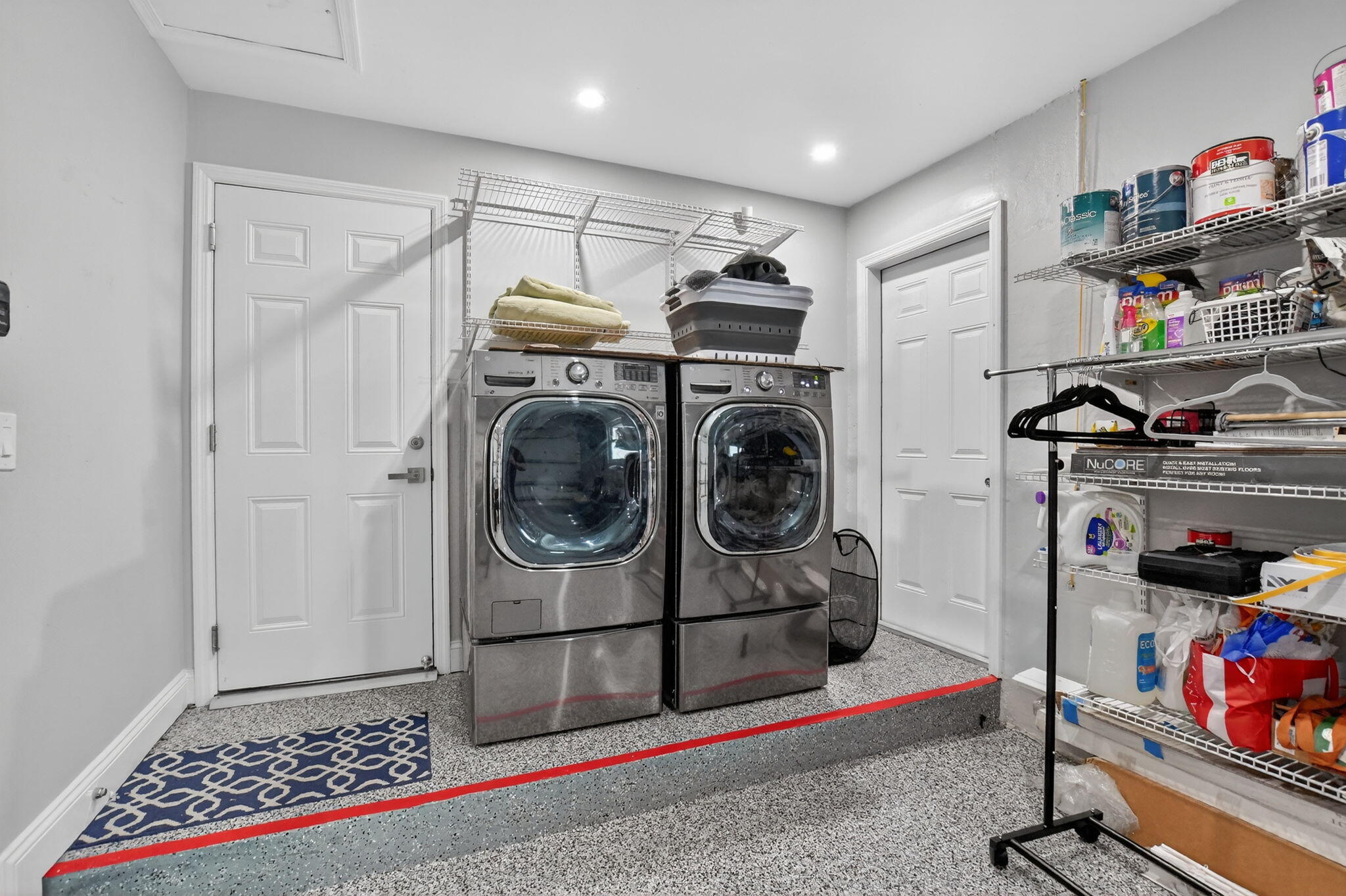 10294 Crosswind Road Boca Raton, FL 33498 - Photo 42 of 71 a view of a storage & utility room with washer and dryer