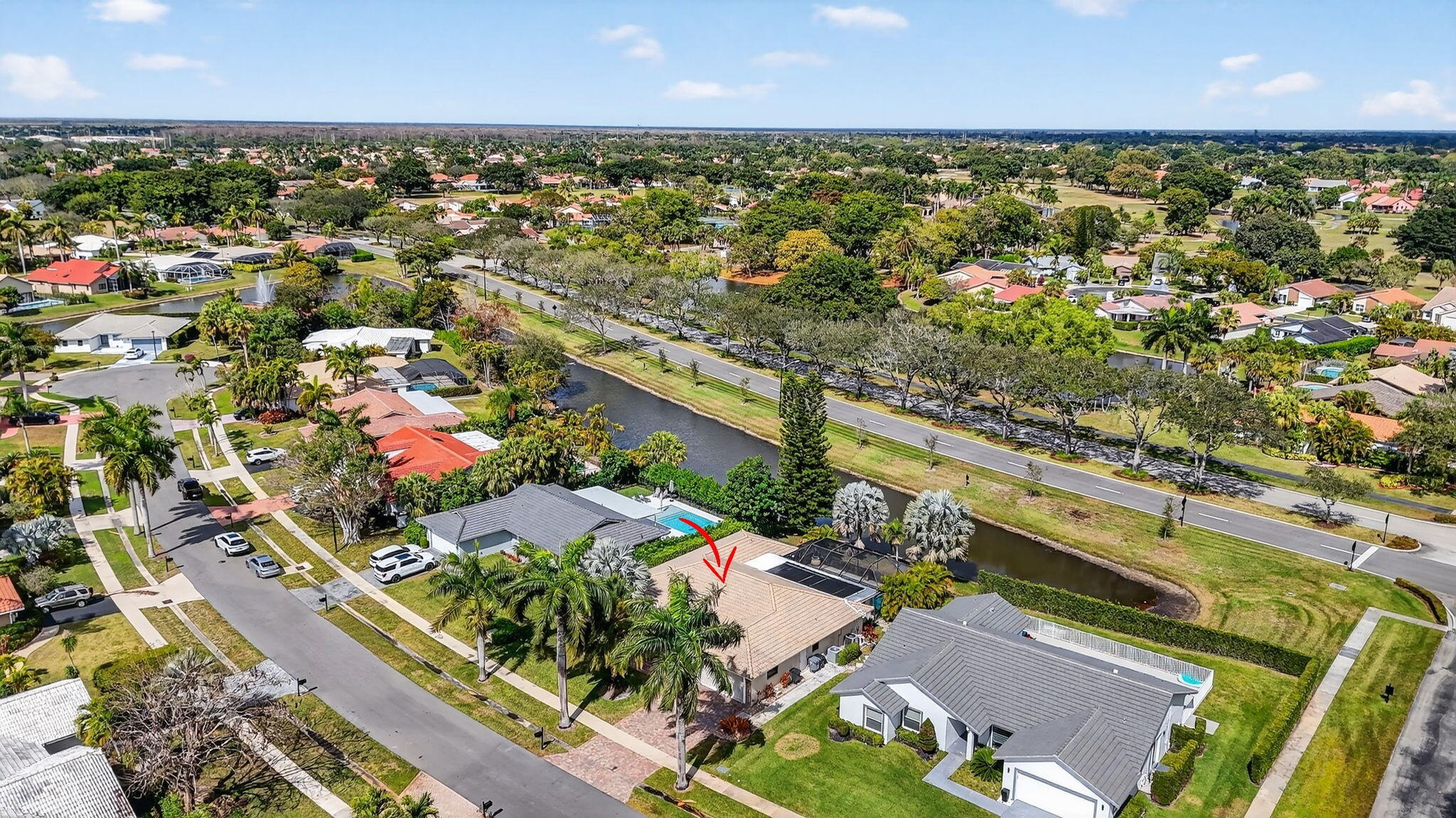 10294 Crosswind Road Boca Raton, FL 33498 - Photo 63 of 71 an aerial view of residential houses with outdoor space