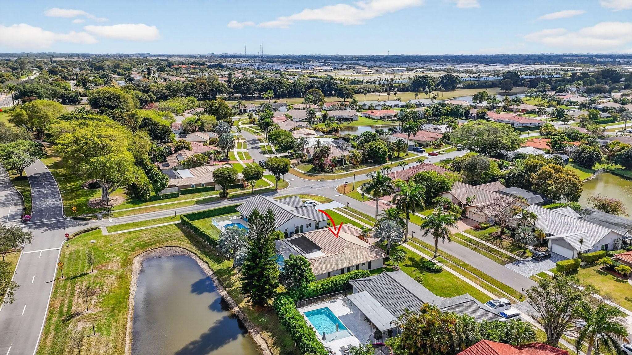 10294 Crosswind Road Boca Raton, FL 33498 - Photo 65 of 71 an aerial view of residential houses with outdoor space and swimming pool