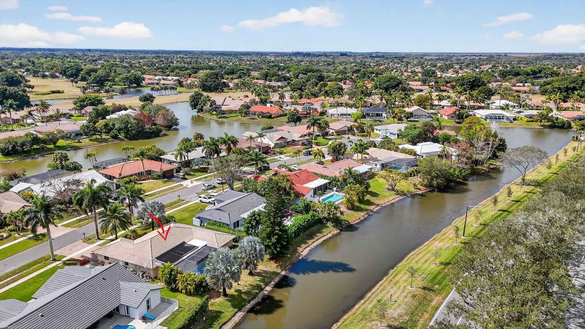 10294 Crosswind Road Boca Raton, FL 33498 - Photo 66 of 71 an aerial view of residential houses with outdoor space