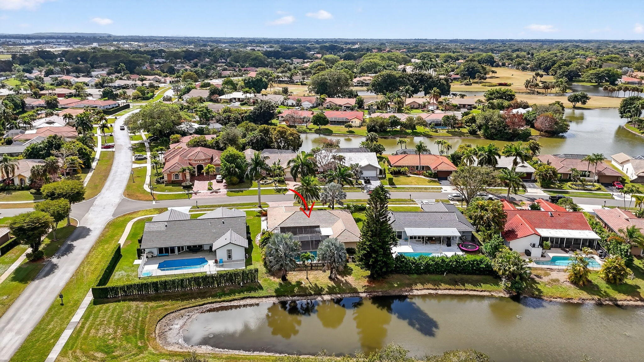 10294 Crosswind Road Boca Raton, FL 33498 - Photo 67 of 71 an aerial view of residential houses with outdoor space and swimming pool