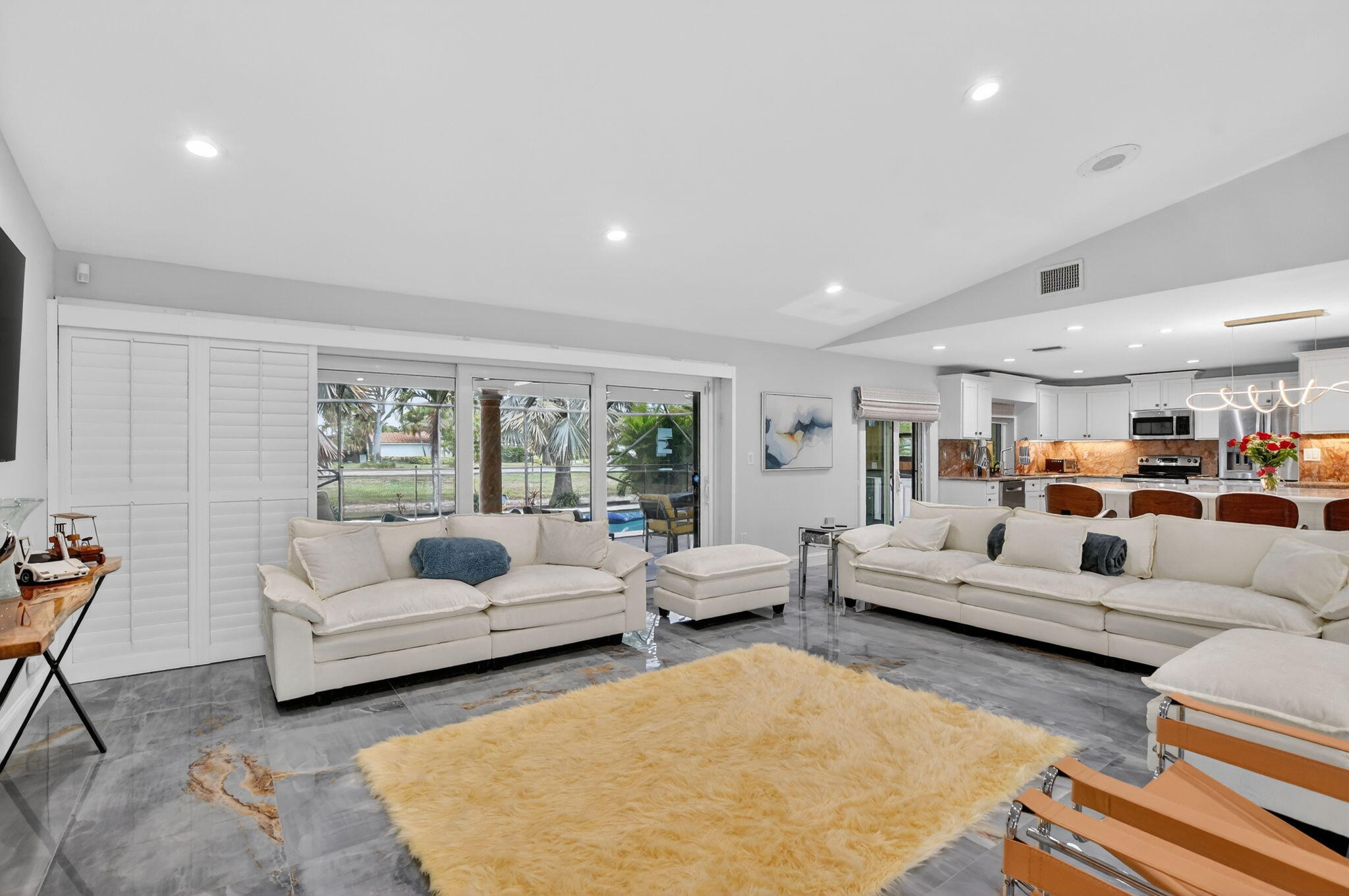10294 Crosswind Road Boca Raton, FL 33498 - Photo 7 of 71 a living room with furniture and a large window