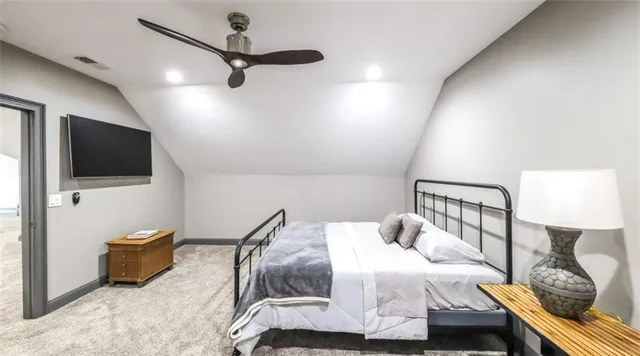 a bed room with furniture and a window