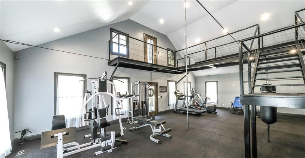 1600 Happy Hollow Road Roopville, GA 30170 - Photo 17 of 41 a view of a room with gym equipment