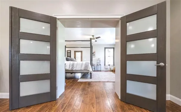 a room with furniture and a flat screen tv