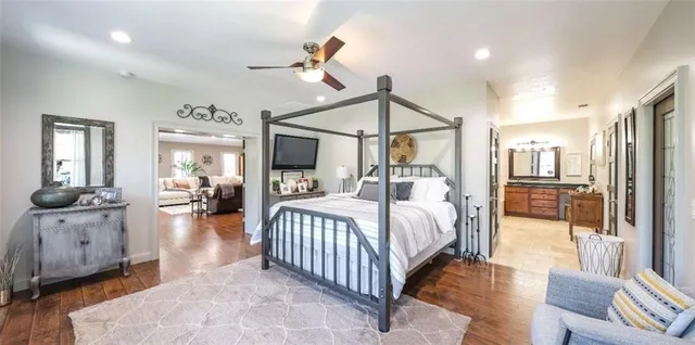 a dining room with furniture and a floor to ceiling window
